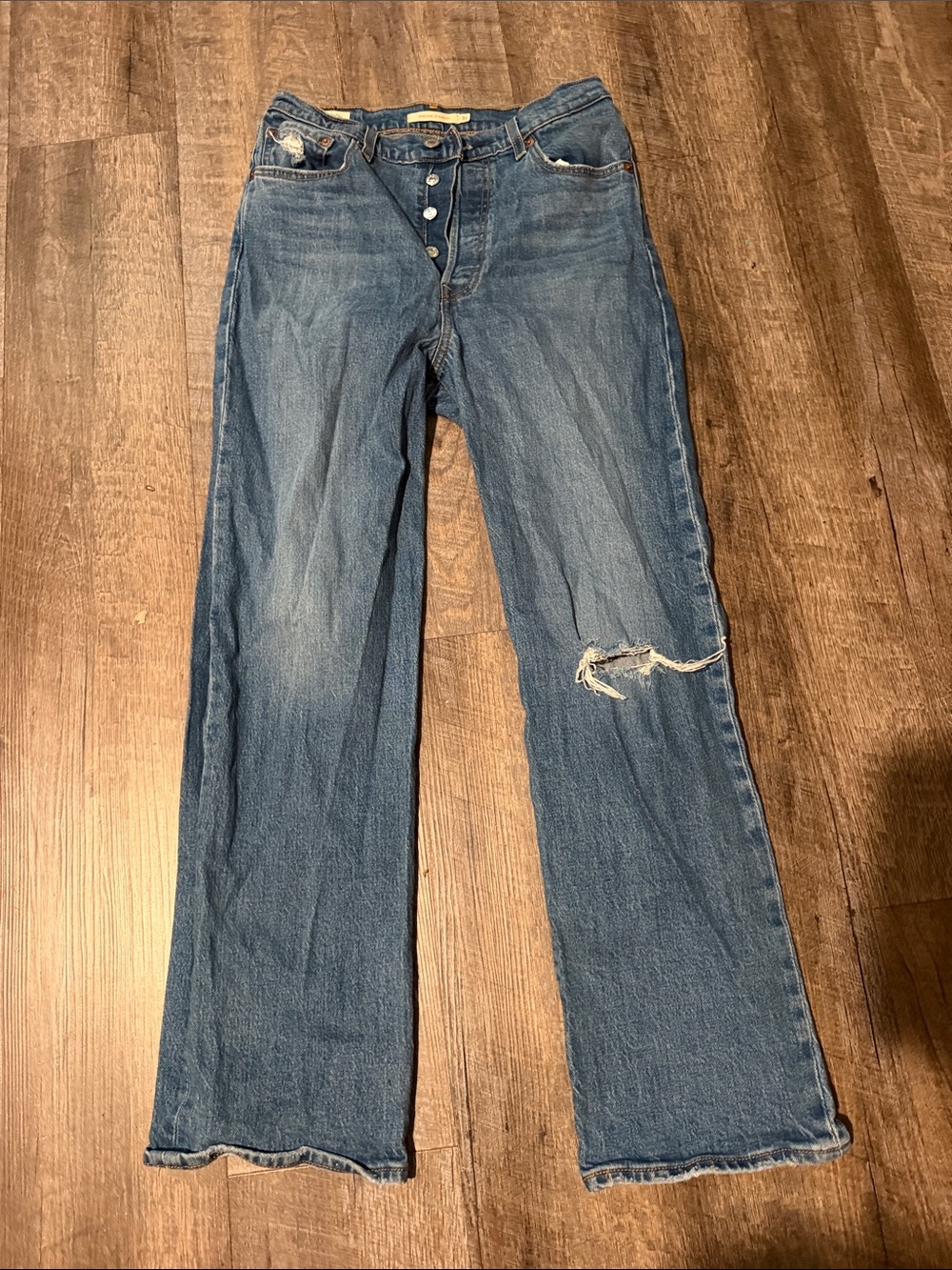 Levi's Medium Blue Flare Jeans with Knee Distress